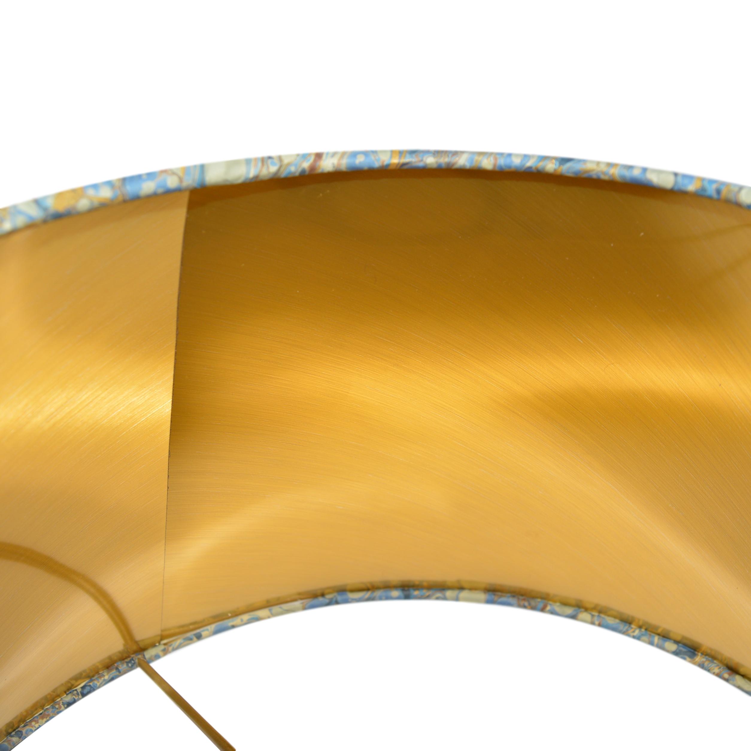 Munro and Kerr blue swirl marbled paper for a handmade tapered drum lampshade with gold lining