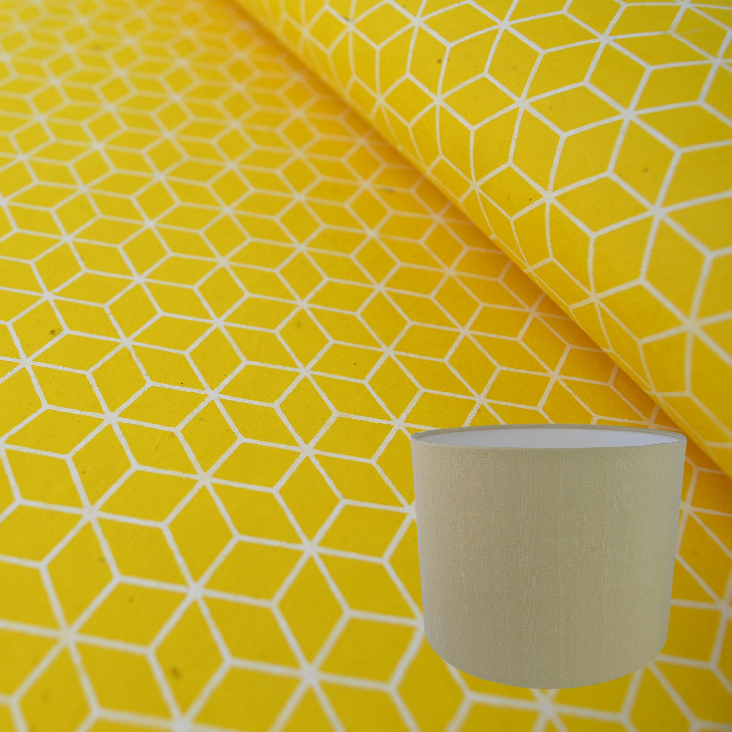 Munro and Kerr yellow geometric hand printed paper for a drum lampshade