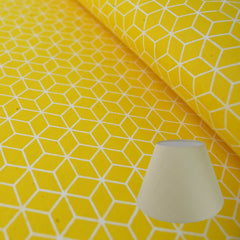 Munro and Kerr yellow geometric hand printed paper for a lampshade