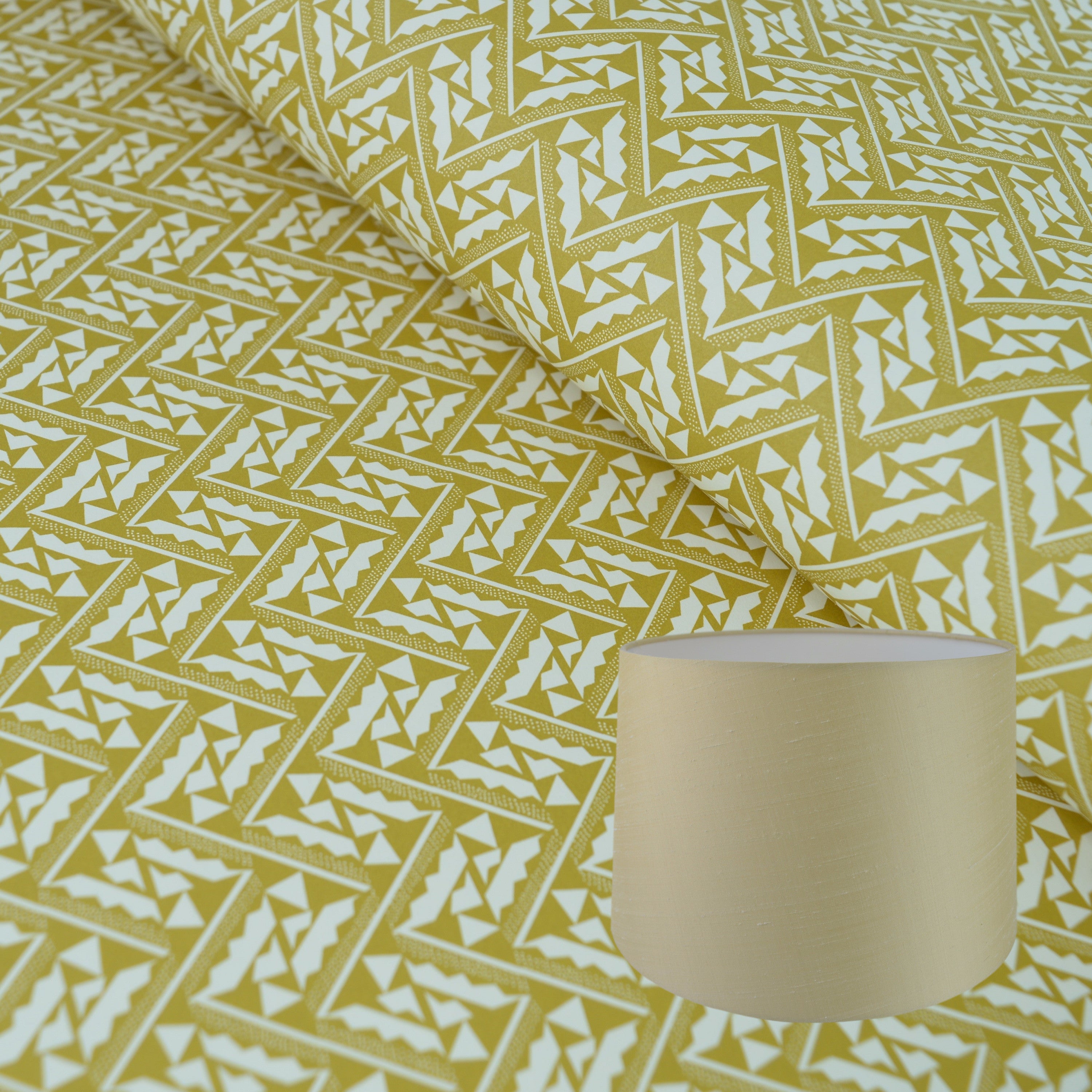 Munro and Kerr yellow printed Esme Winter paper for a tapered drum lampshade